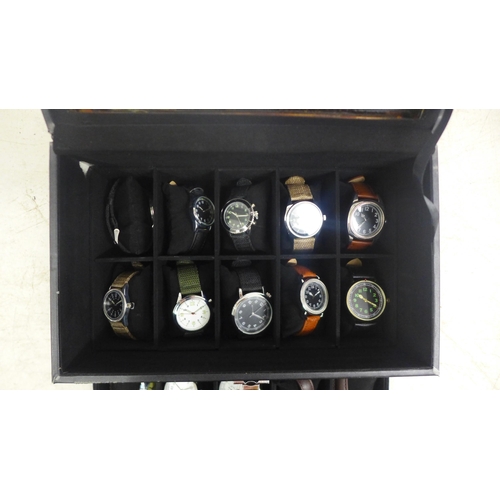 2107 - A display box containing gentleman's wristwatches (twenty per box)