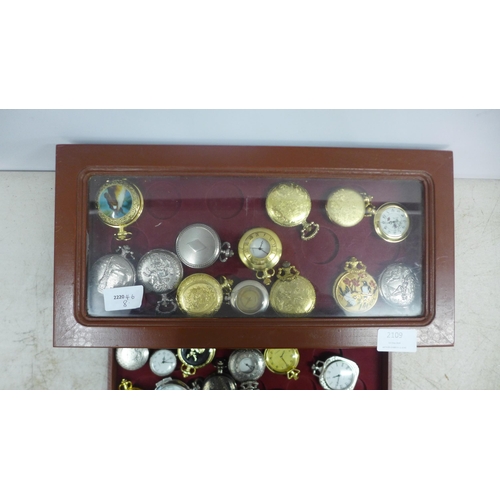 2109 - A display cabinet with three drawers of pocket watches