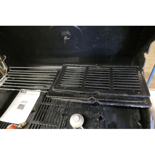 2150 - A gas fueled Blooma BBQ with electronic ignition, 4 burners, weather resistant cover and a part full... 