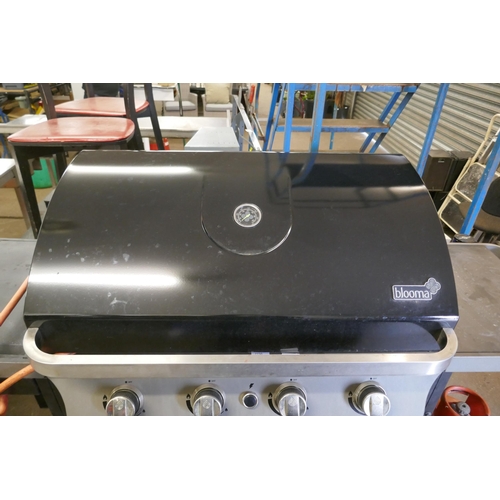 2150 - A gas fueled Blooma BBQ with electronic ignition, 4 burners, weather resistant cover and a part full... 