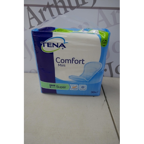 2382 - A box of four packs of Tena Mini super absorbent sanitary pads - 30 pads per pack