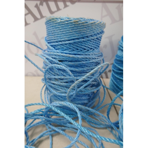 2390 - Three reels of blue heavy-duty polypropylene rope in assorted lengths