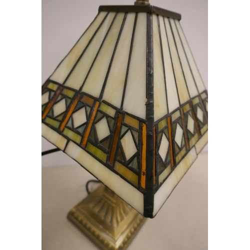 2398 - A quantity of lighting including a Tiffany style lamp, brushed brass effect lamp, angle poise style ... 