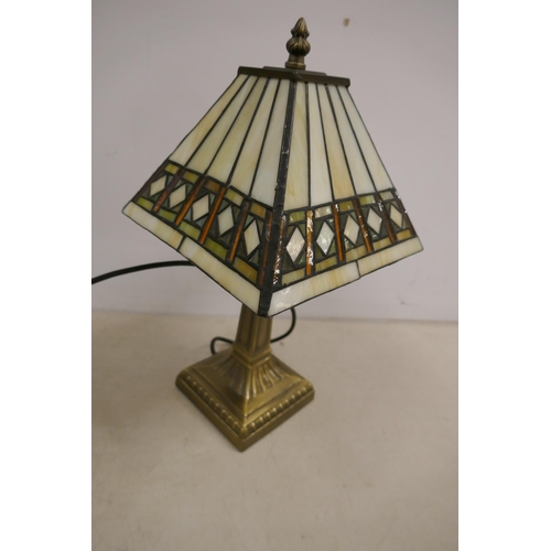 2398 - A quantity of lighting including a Tiffany style lamp, brushed brass effect lamp, angle poise style ... 