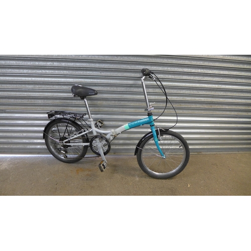 2161 - A compass folding bike with pannier rack. *Police repossession