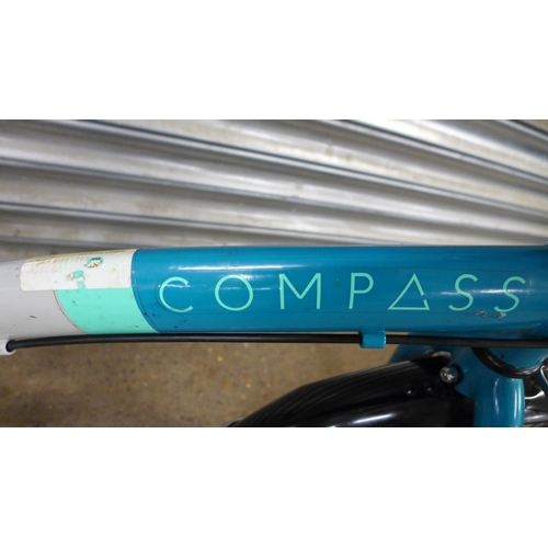 2161 - A compass folding bike with pannier rack. *Police repossession