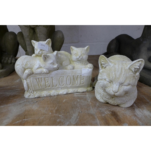 2232 - Four assorted stone effect concrete cat garden ornaments