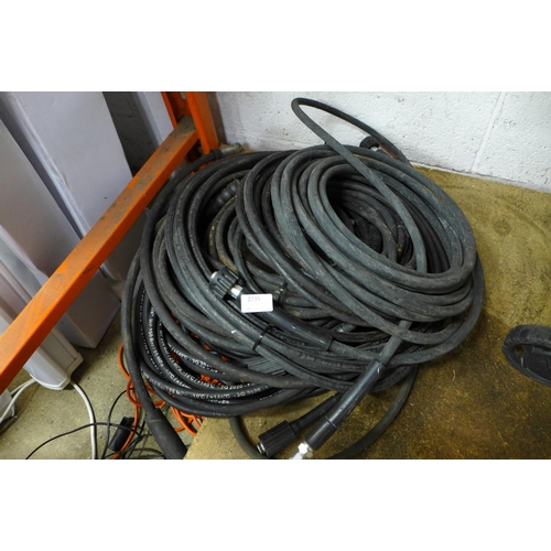 2235 - A large quantity of assorted power wash hoses