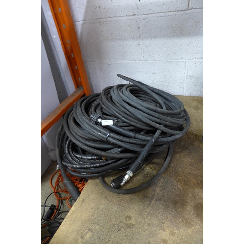 2235 - A large quantity of assorted power wash hoses