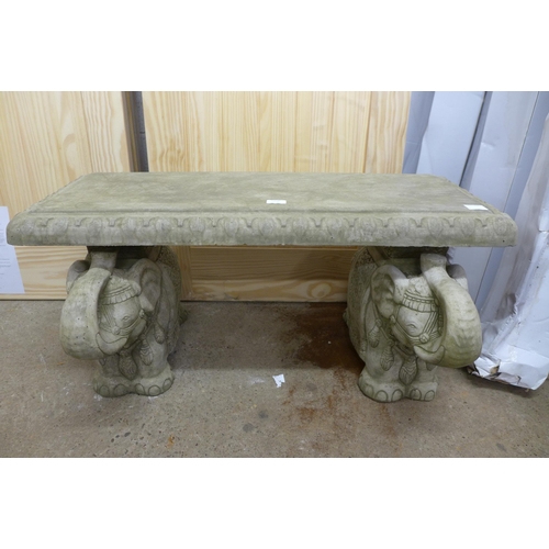 2238 - An oriental style stone effect concrete garden bench with elephant pedestal base