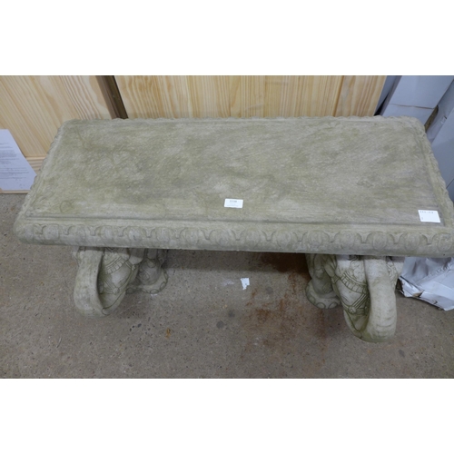 2238 - An oriental style stone effect concrete garden bench with elephant pedestal base