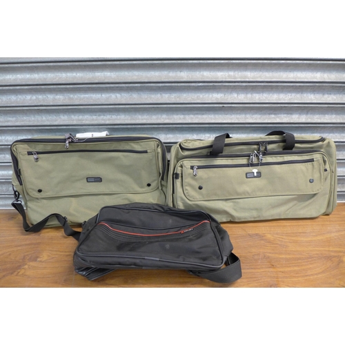 2302 - Two unused Pierre Cardin holdalls and a Delsey holdall