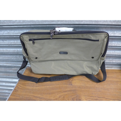 2302 - Two unused Pierre Cardin holdalls and a Delsey holdall