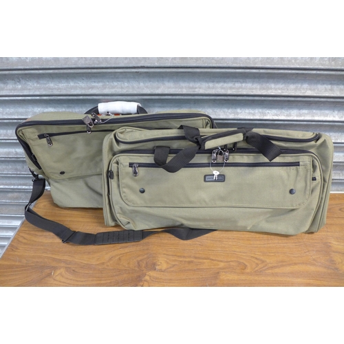 2302 - Two unused Pierre Cardin holdalls and a Delsey holdall