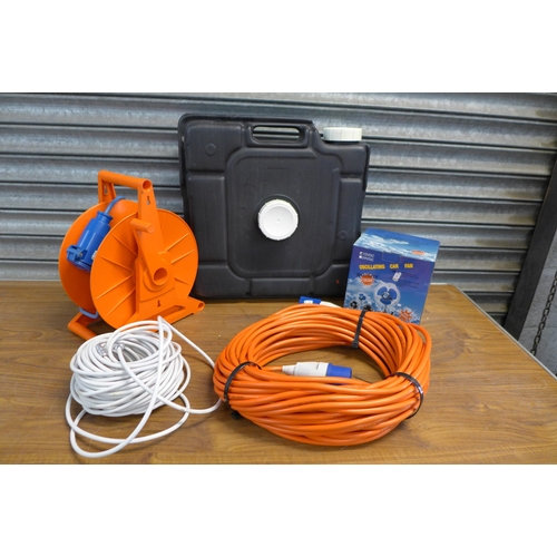 2304 - 2 Caravan/motor home hook up cables, a length of aerial cable, a waste tank and a 12v oscillating ca... 