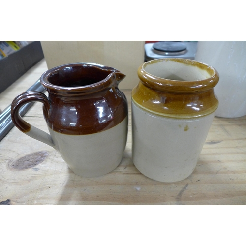 2305 - Three stoneware jars and a stoneware jug