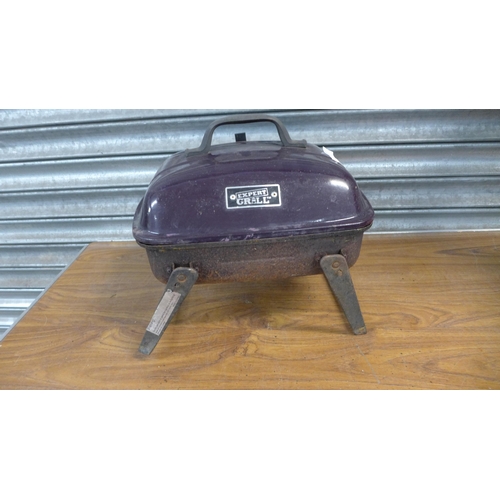 2319 - An Ozark Trail folding chair and an Expert Grill kettle BBQ