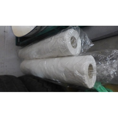 2226A - Three part rolls of gardening membrane and two rolls of white tissue paper