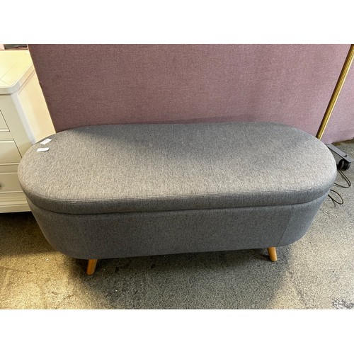 1531 - Oval grey upholstered ottoman