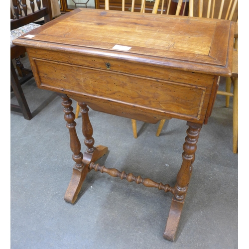 169 - A 19th Century French walnut lady's sewing table