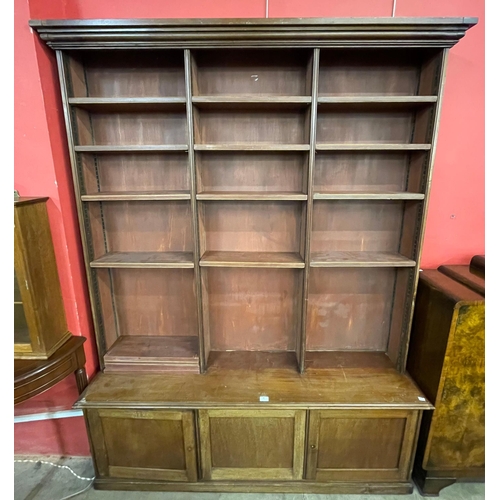 176 - An Edward VII mahogany open bookcase