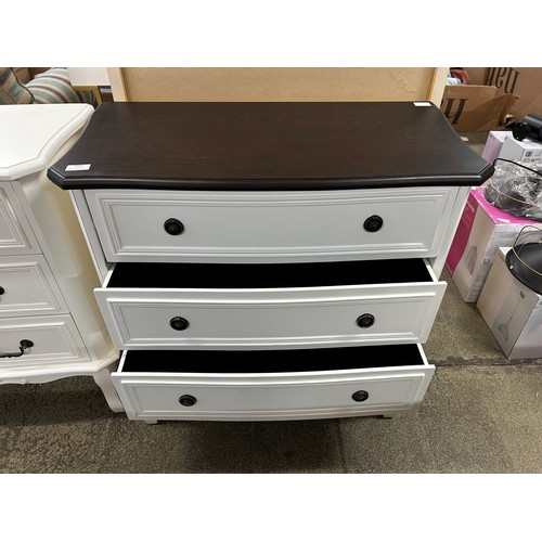 1602 - A three drawer chest with contrast top