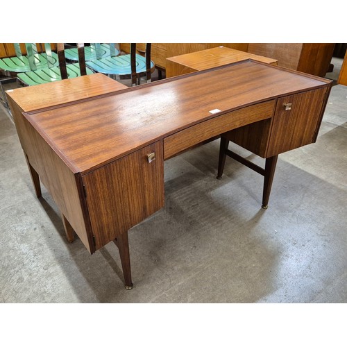 38 - An afromosia desk