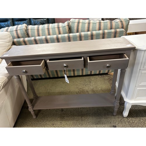 1604 - A grey three drawer console table