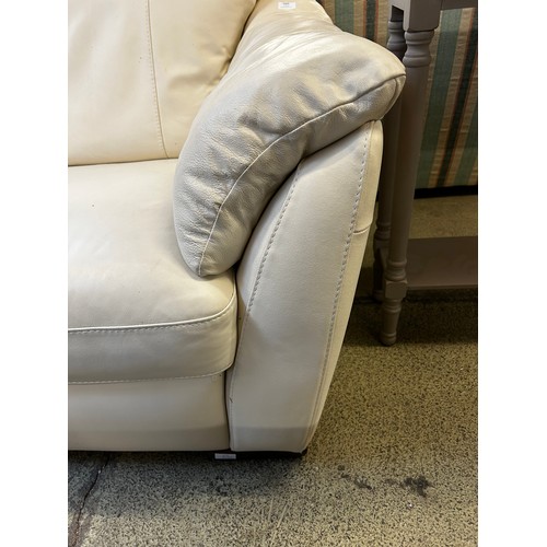 1605 - Cream leather two seater sofa