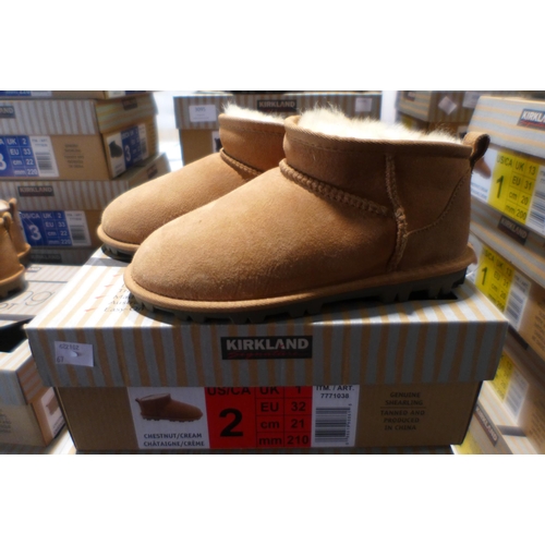 3099 - Pair of children's Kirkland Signature chestnut coloured Shearling boots - UK size C1 * this lot is s... 