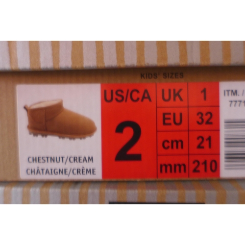 3099 - Pair of children's Kirkland Signature chestnut coloured Shearling boots - UK size C1 * this lot is s... 