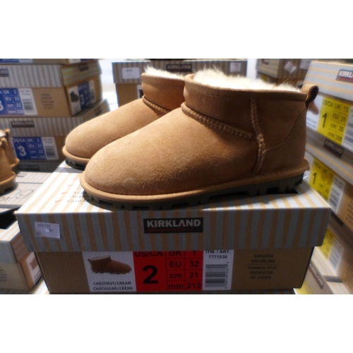 3100 - Pair of children's Kirkland Signature chestnut coloured Shearling boots - UK size C1 * this lot is s... 