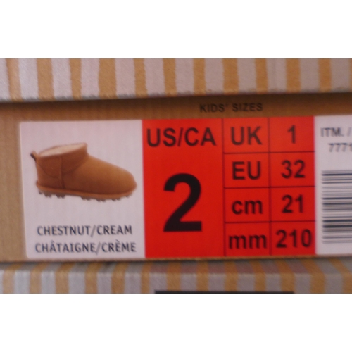 3101 - Pair of children's Kirkland Signature chestnut coloured Shearling boots - UK size C1 * this lot is s... 