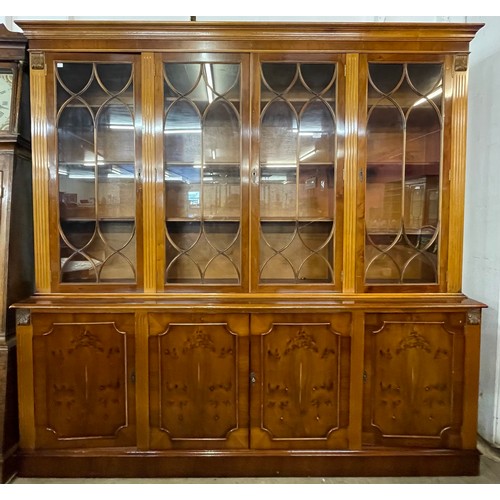 179 - A Regency style yew wood library bookcase