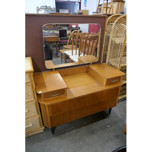 108 - A teak dressing table