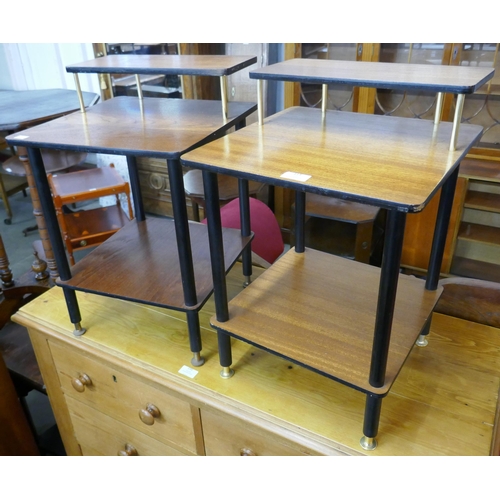 115 - A pair of teak and black leg side tables