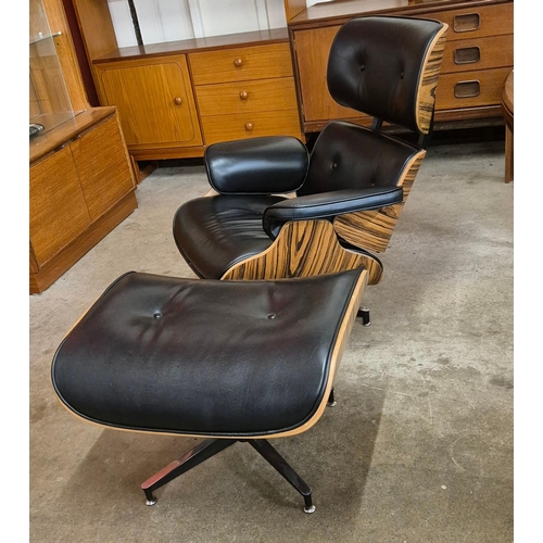 12 - A Charles & Ray Eames style revolving lounge chair and ottoman