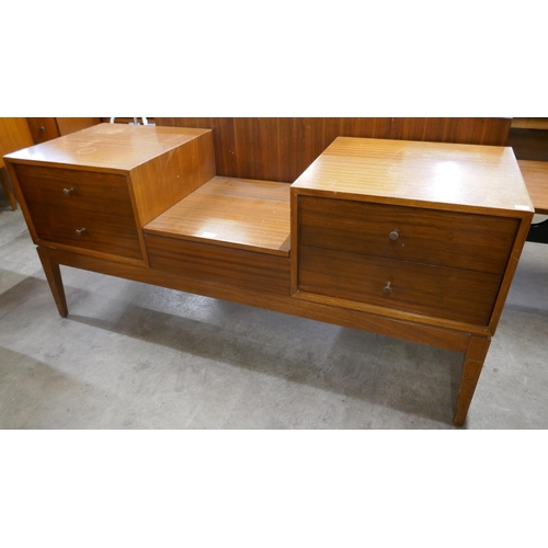 121 - A Uniflex teak dressing table