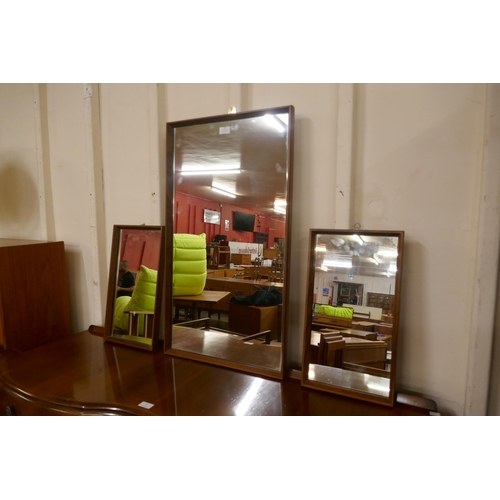 127 - A pair of teak framed mirrors and one other