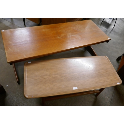 141 - A teak coffee table and a simulated rosewood coffee table