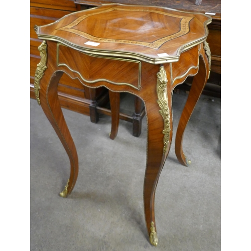 158 - A French Louis XV style walnut and gilt metal mounted single drawer gueridon table