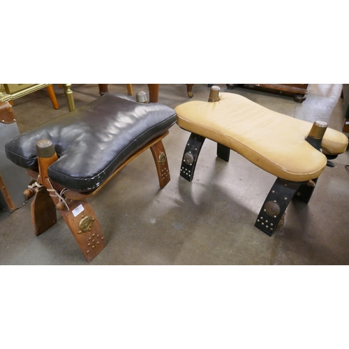 160 - A pair of African hardwood camel stools