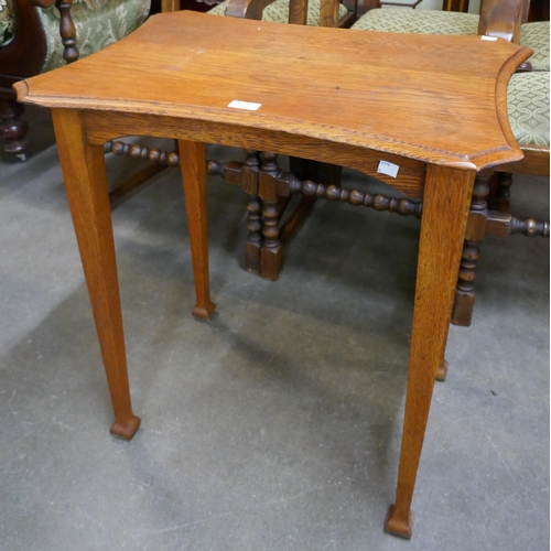 163 - An Arts and Crafts oak occasional table