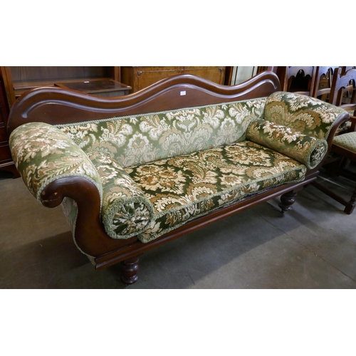 A Victorian mahogany and fabric upholstered scroll arm settee
