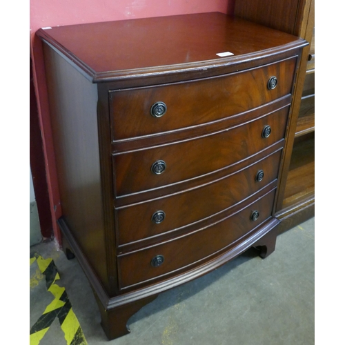 180 - A small George III style mahogany bow front chest of drawers