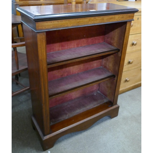 191 - A Victorian inlaid walnut open bookcase