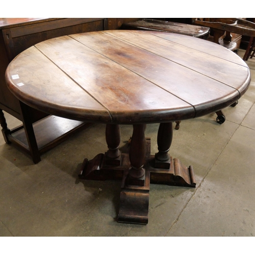 242 - A French hardwood circular centre table