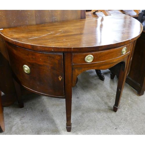 284 - A George III style mahogany demi lune sideboard