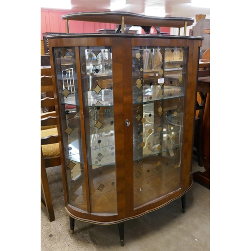 328 - A walnut cocktail cabinet