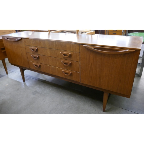 34 - A Beautility teak sideboard